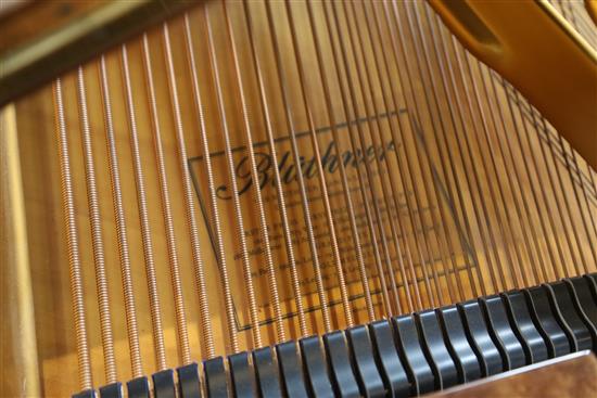 A Bluthner Model 6 flame mahogany cased grand piano, W.4ft 10in. L.6ft 3in. H.3ft 3in. A Bluthner Model 6 flame mahogany cased grand piano, W.4ft 10in. L.6ft 3in. H.3ft 3in.